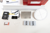 The picture shows a selection of experiment materials, including a laser device, a metal plate, a scale and flexible supports. These parts are designed for optical experiments in educational settings and provide essential support to students in their learning