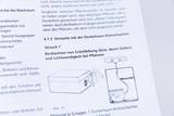 The image shows a page from a textbook with instructions for experiments to observe plant growth under light and dark conditions. Shown are a darkroom germination shadow and a schematic plant experiment.