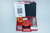 The mini box for experimental physics contains materials for researching magnetism and electrostatics. Inside there are various objects such as a red disk, rubber items and a manual for experiments.