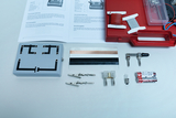 The picture shows a selection of experimental materials, including a circuit unit, cables, various metal strips and batteries, which can be used for physics experiments. Instructions on how to carry out experiments are also included.