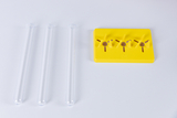 The picture shows three transparent test tubes and a yellow holder with three holes used to hold the tubes in place. This equipment is ideal for educational chemistry experiments.