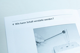 The image shows a page from a textbook with the question &quot;How can sound be amplified?&quot; and an illustration showing a resonator and a sound bar. It is part of an experiment to explore acoustic phenomena.