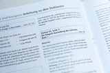 The image shows instructions for an experiment involving magnetism, including materials and stations for implementation. The text is structured and provides information on preparing and carrying out the activities in the 