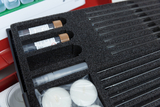 The picture shows a foam tray with various laboratory utensils, including two test tubes and a syringe container, which are safely stored. In addition, the picture shows several transparent tubes and some white plates, which are for 