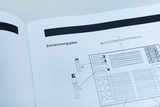 The picture shows a layout plan printed in a manual. It shows various materials and their arrangement, presumably for use in experiments in the educational field.
