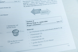 The image shows instructions for an experiment that investigates why a ball floats. It lists the materials needed, including light and heavy clay and other utensils for conducting the experiment.