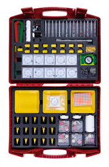 The picture shows a red suitcase containing a variety of experimental materials for teaching, including glass tubes, magnetic objects and measuring instruments. The carefully arranged components are encased in foam and offer a