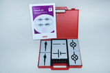The picture shows a red set called &quot;Electricity 2.0&quot;, which consists of various components for experiments in the field of electrical engineering, including connectors and circuits. The set also includes instructions for the students.