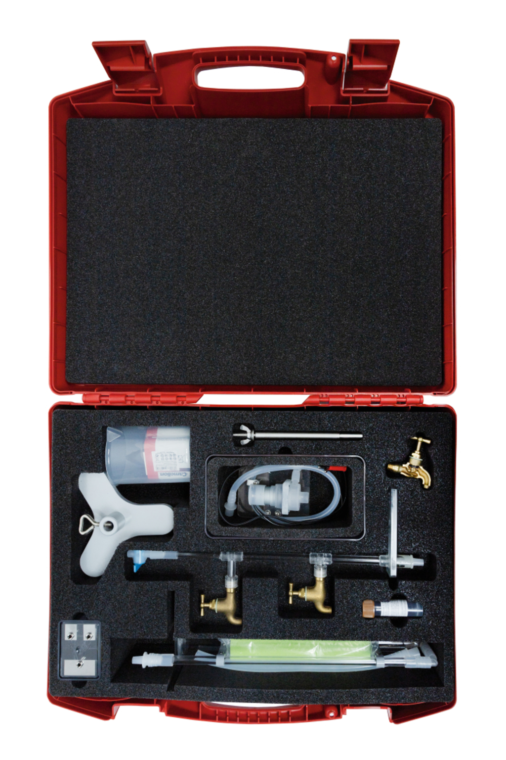 The picture shows a red carrying case filled with various experimental equipment for teaching. The equipment includes tubes, valves and a syringe, which can be used for practical scientific experiments.