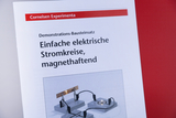 The picture shows instructions for an experiment with simple electrical circuits that are magnetically adhesive. It provides information about a demonstration kit from the educational sector of Cornelsen Experimenta.
