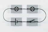 The picture shows an experimental device consisting of four square component-like boxes that are connected to each other. Various circuits and elements such as resistors and switches are shown that can be used to carry out physics experiments.