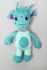 The image shows a cute, plush creature with a turquoise body and large, expressive eyes. It has a smiling facial expression and prominent ears, giving it a friendly and welcoming appearance.