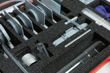 The picture shows an assortment box filled with various experiment materials, including grey components and transparent tubes. The parts are neatly arranged in a protective foam insert, ideal for educational purposes.
