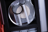The image shows a set of experimental materials, including a Petri dish, a delicate metal structure, and two silver rods. These components are neatly arranged in a padded case designed for educational purposes.