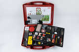 The picture shows a comprehensive experiment kit in a red case, which contains various components such as tools, materials and instructions. It is designed for educational purposes in science and technology in the German school system.