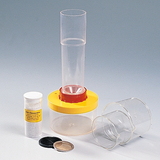 The picture shows a set of experimental accessories, which consists of several transparent containers, a yellow base and two sieves. Next to these components is a can with a white powder that can be used for scientific experiments.