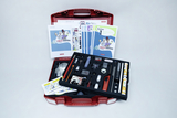 The picture shows an experiment kit for schools on the topic of air, stored in a red suitcase. The suitcase contains various utensils and instructions for conducting experiments on the composition of air.