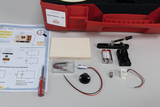 The picture shows an experiment set called &quot;eXperTeenies - Air&quot;, which contains various components such as batteries, circuits and instructions. These materials are used to carry out experiments in the educational field, especially for researching air and electrical circuits.