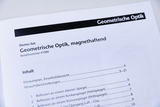 The picture shows a page from a magnetic geometric optics demo set. It contains the title, the order number and a table of contents with various experiment instructions for reflection on different types of mirrors.
