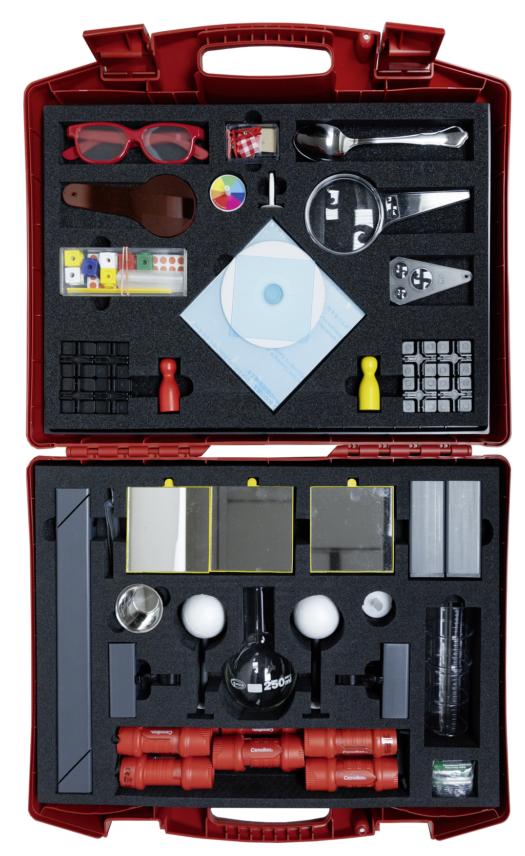 The picture shows a red suitcase full of experimental materials, including mirrors, pipettes, various shapes of containers and toy figures. The equipment is specially designed for use in education and promotes experimental learning.