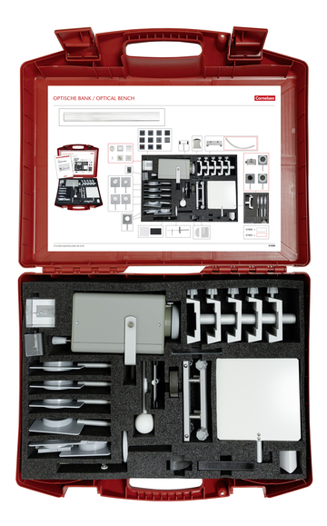 The picture shows a red suitcase equipped with an optical bench containing various optical elements and devices. The contents are neatly arranged and allow for conducting experiments in the field of optics for educational purposes.