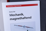 The picture shows a demo set entitled &quot;Mechanics, magnetic&quot; from the Cornelsen Experimenta range. It contains instructions for carrying out experiments in the field of mechanics that demonstrate magnetic properties.