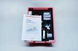 The picture shows a student set for energy conversion, which is housed in a red filing system. In addition to various experimental materials, there is an instruction booklet that explains how to carry out the experiments.