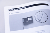The picture shows a page from an optics textbook that deals with the topic of light refraction. It shows an experimental setup and a protractor that are used to conduct experiments on light.