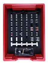 The picture shows a set of experimental setups in a red storage box, consisting of various electrical components and connectors. The parts are neatly arranged on a padded base to make organization easier.