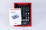 The picture shows an electronics student set in a red case that contains various components for experiments. There are also instructions with information about the experiments and how to use the set.