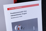 The image shows a product description for a functional model of the human eye from an online shop for experimental supplies. It contains information about the order number and an image that visualizes the model.