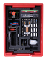 The picture shows an experiment kit with various components, including motors, wires and measuring instruments, all carefully arranged in a red plastic container. The kit is designed for use in schools and promotes hands-on learning in science.