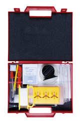 The image shows a red toolbox filled with various experimental materials, including microscope slides, pipettes, a paint dropper, and other laboratory equipment. The box is ideal for school experiments in science lessons.