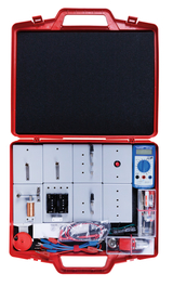 The picture shows a red case equipped with various experimental components and a multimeter. The individual parts are arranged in a structured manner and offer a wide range of possibilities for practical experiments in the educational sector.