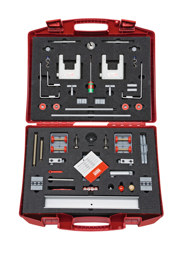 The picture shows a red toolbox containing various experimental materials. Inside are various components such as brackets, rods and accessories for experimental applications in school education.