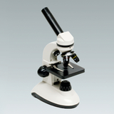 The picture shows a microscope used for educational purposes. It has a robust design with multiple lenses and a stable base, ideal for experiments in the laboratory.