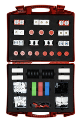 The image shows a red suitcase filled with various experimental materials, including balls, wheels, building blocks, and other components for educational use. The sorted pieces are arranged in a foam insert for easy organization.