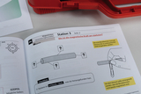 The image shows a page from a textbook on magnetic properties and experiments. It contains instructions on how to conduct an experiment to determine the strength of the magnetic field at different points on a magnet.