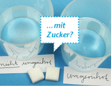 Two transparent cups of water are placed on a blue background. One of the cups is labeled &quot;unstirred&quot; and the other &quot;stirred,&quot; while two sugar cubes are placed in the center, and a speech bubble appears asking &quot;...with sugar?&quot;